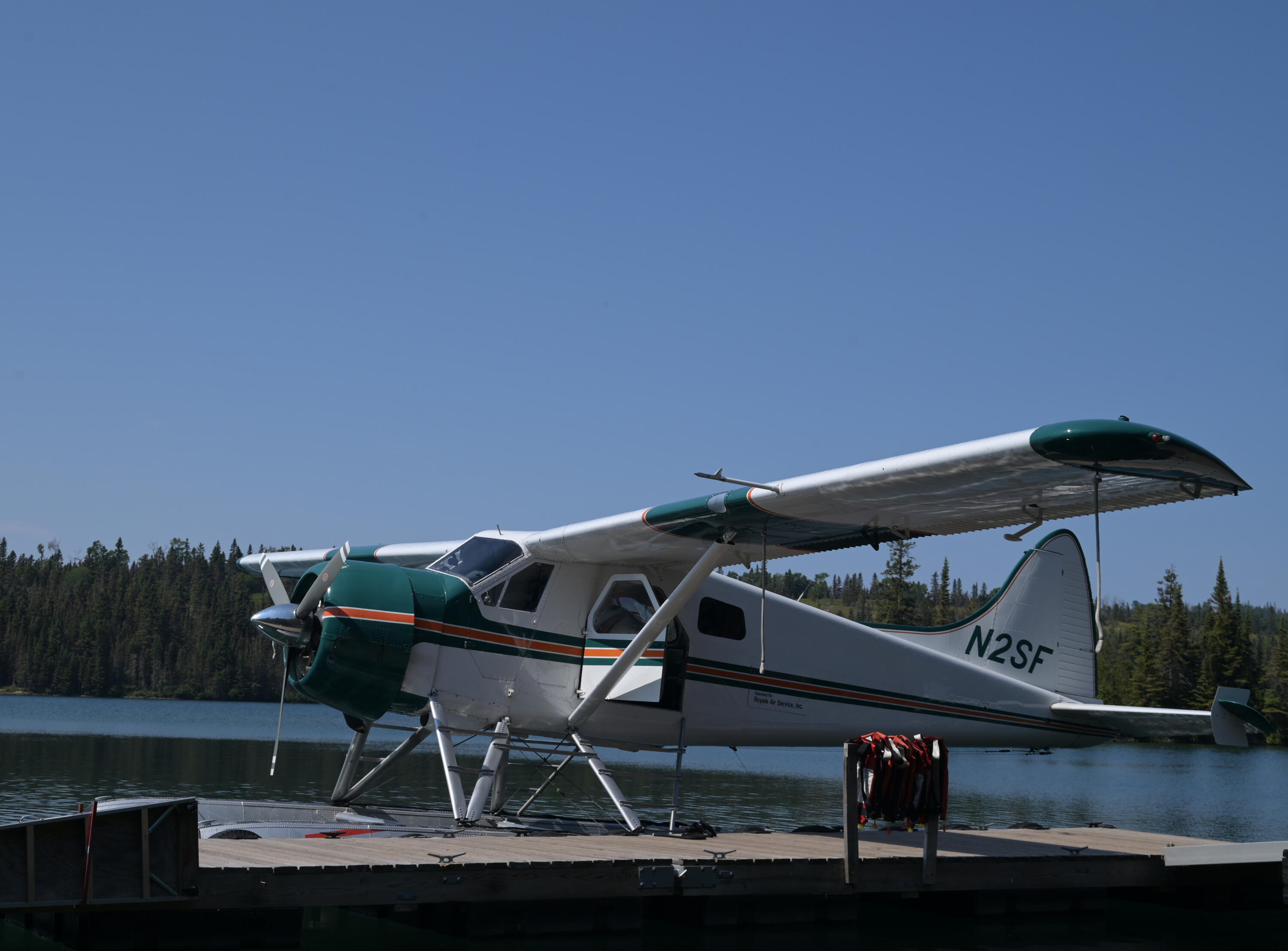 Sea plane back from Isle Royale A photo of a white float / sea plane docked in Tobin Harbor / Rock Harbor in Isle Royale National Park
